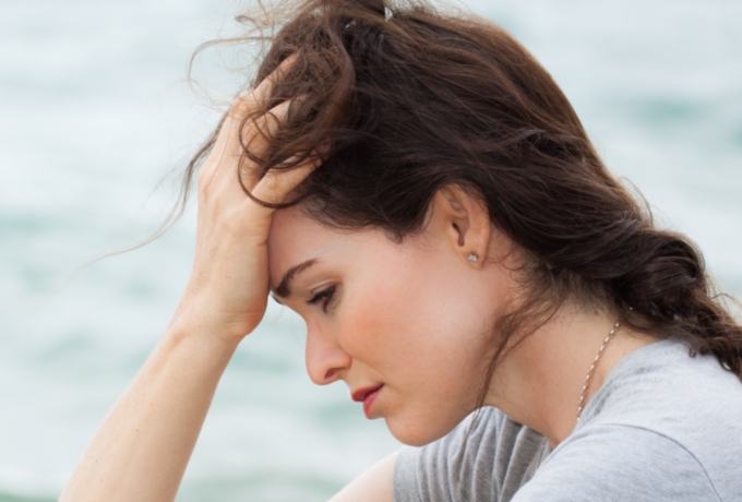 Upset woman worrying constantly