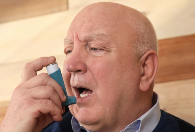 Older man living with chronic asthma
